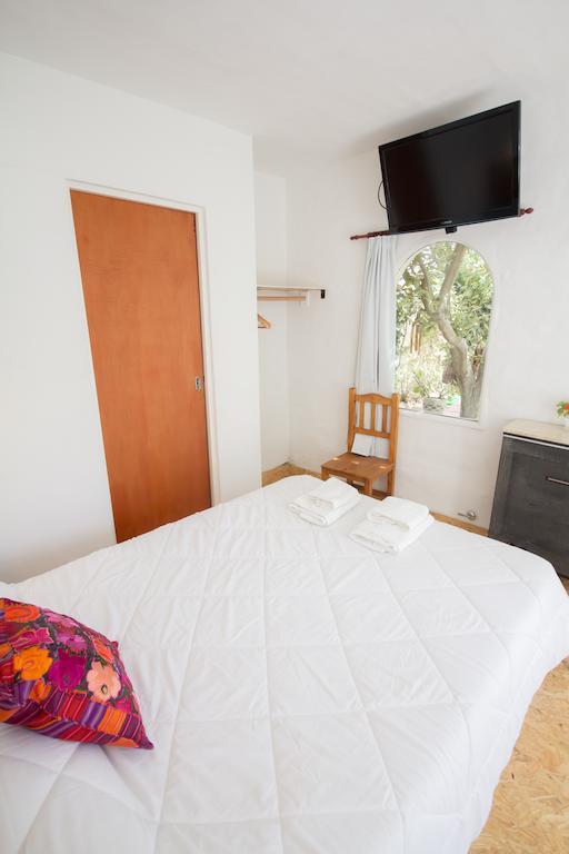 פוארטו מדרין Hosteria Casa De Mar חדר תמונה